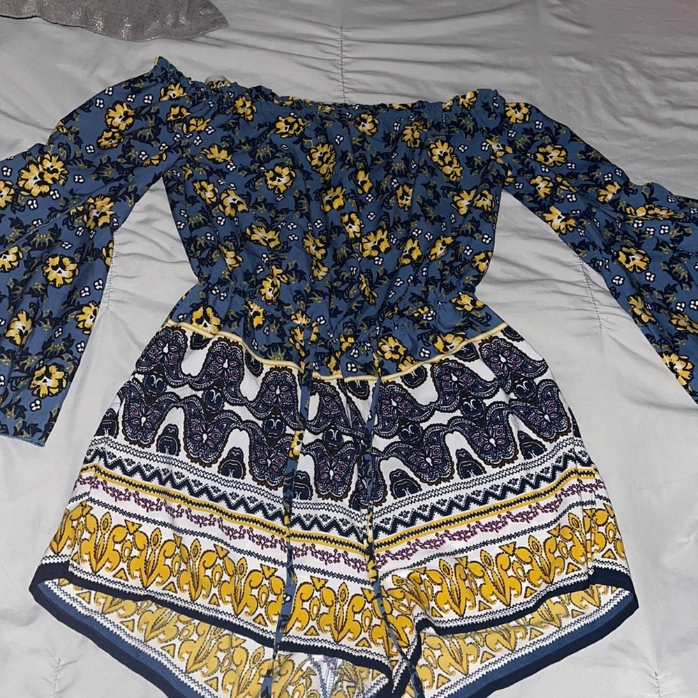 Long sleeve off the shoulders , short romper